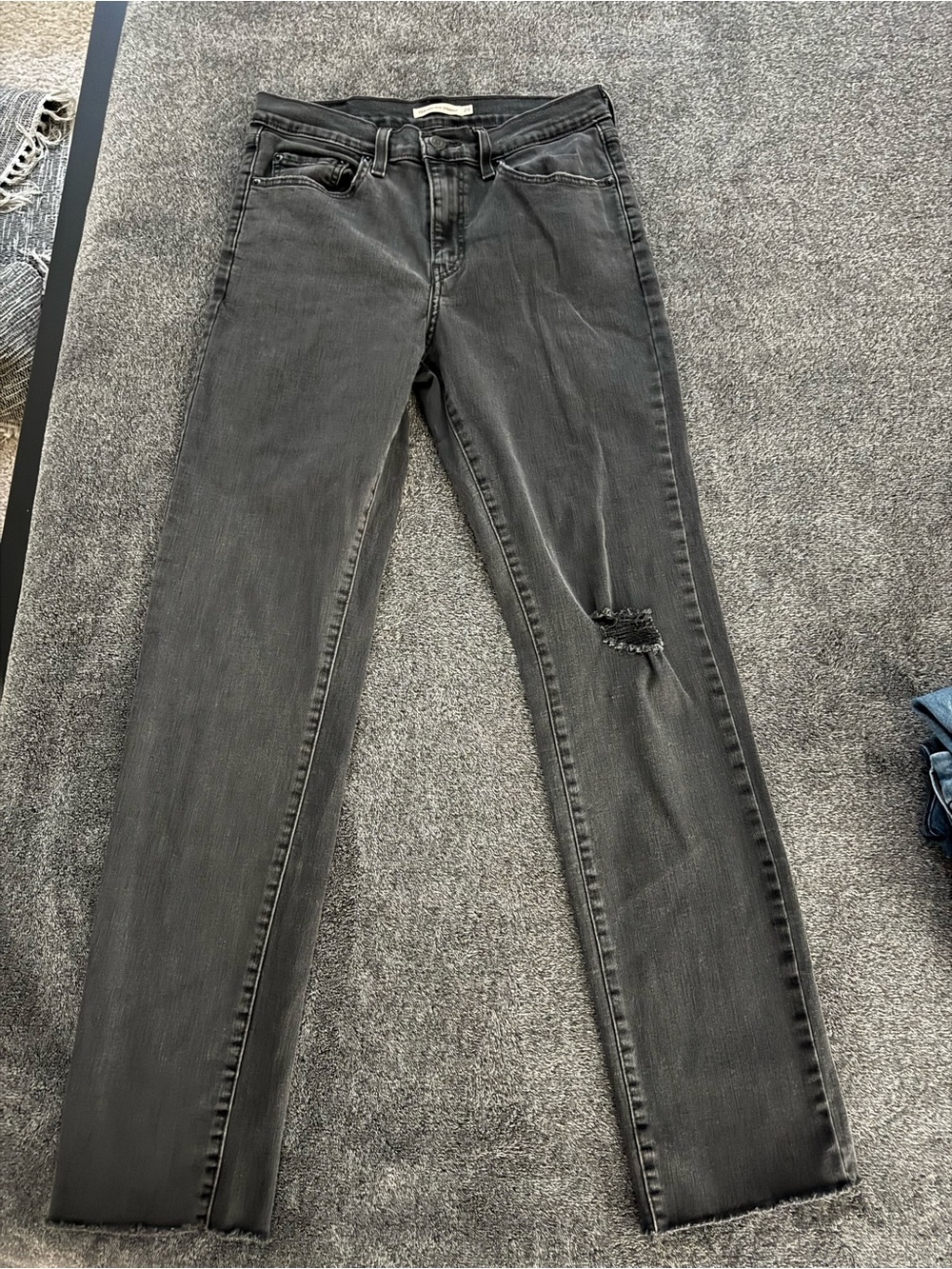 Levi's Women's Black Skinny Jeans with Knee Rip